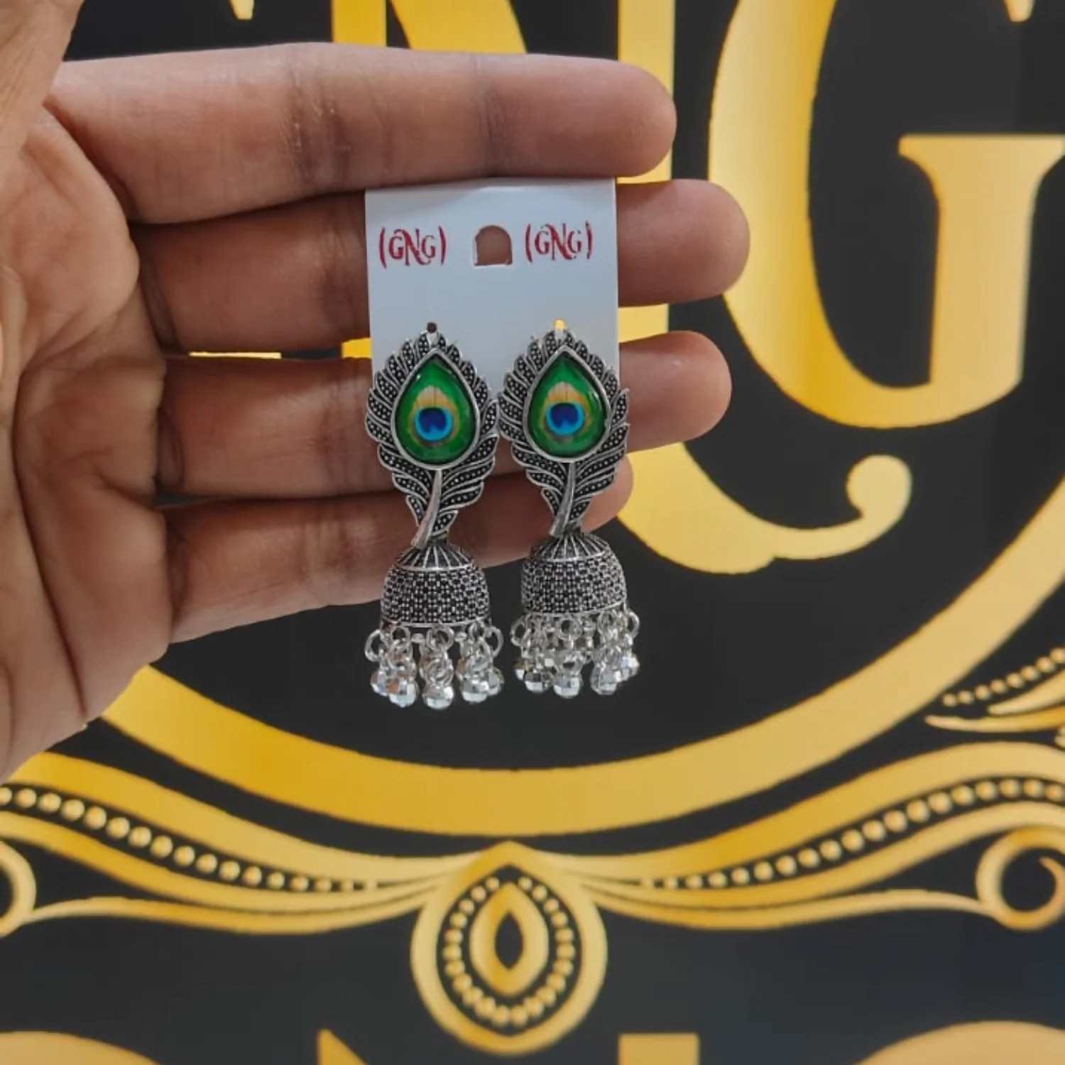 Oxidised Silver Jhumka Earrings Designed With Elegant Peacock Feather - Image 4