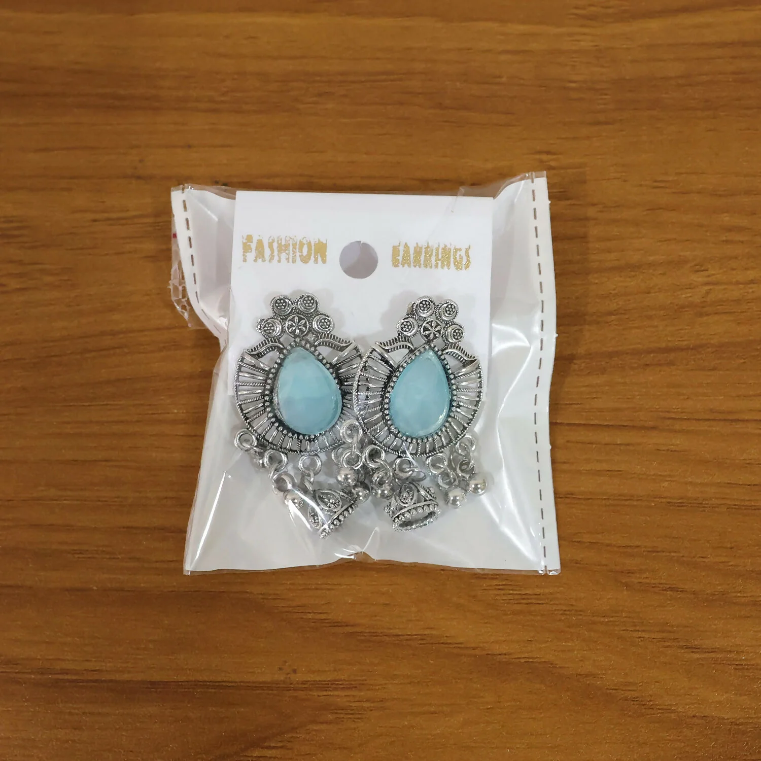 Oxidized Silver Teardrop Jhumka Earrings with Sky Blue Stone and Ghungroo Charms - Image 5