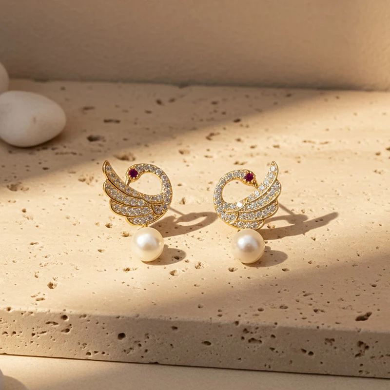 Pearl Drop Swan Design Stud Earrings with Crystal Detailing and Gold Finish - Image 2