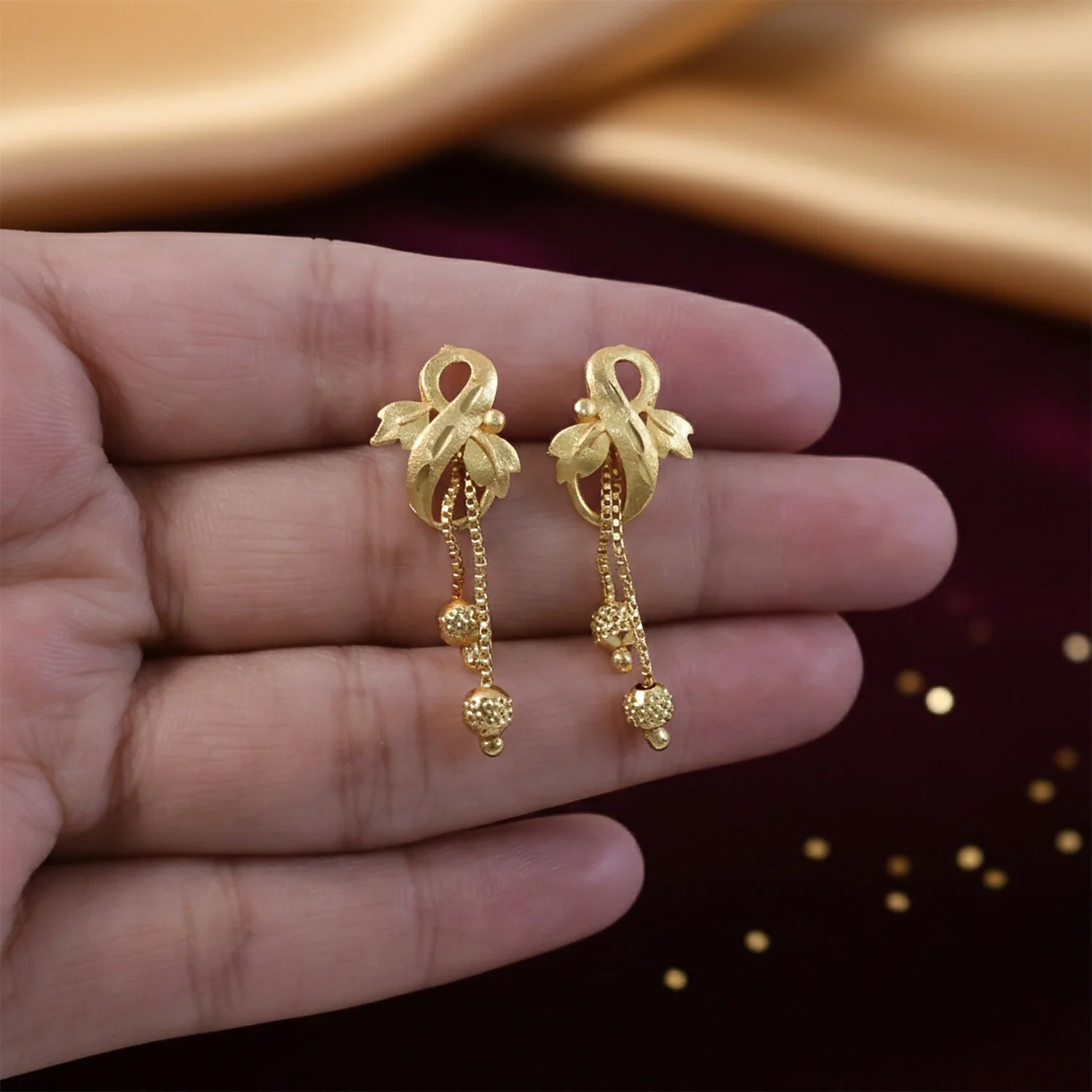 Regal Botanical Motif Gold Drop Earrings with Cascading Chain Bead Accents - Image 3