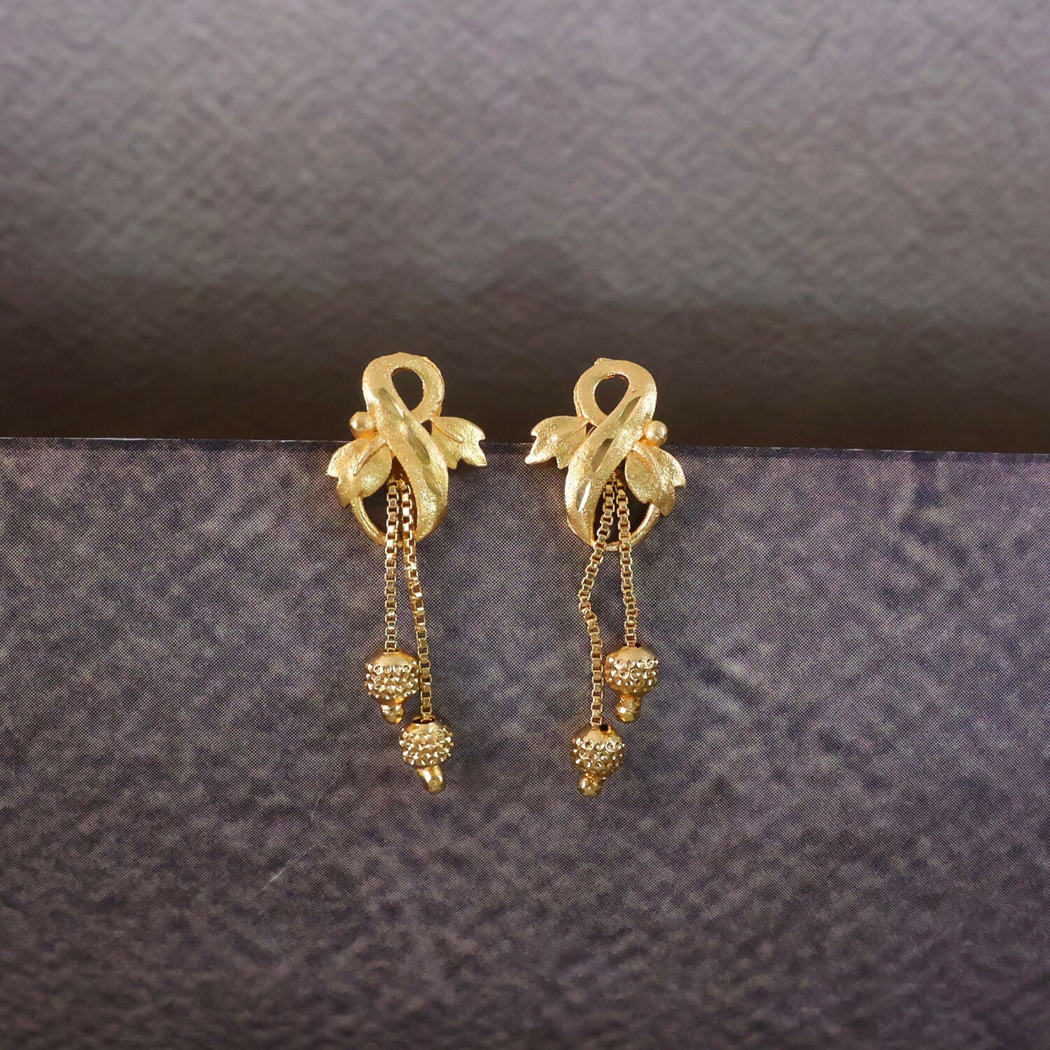 Regal Botanical Motif Gold Drop Earrings with Cascading Chain Bead Accents - Image 4