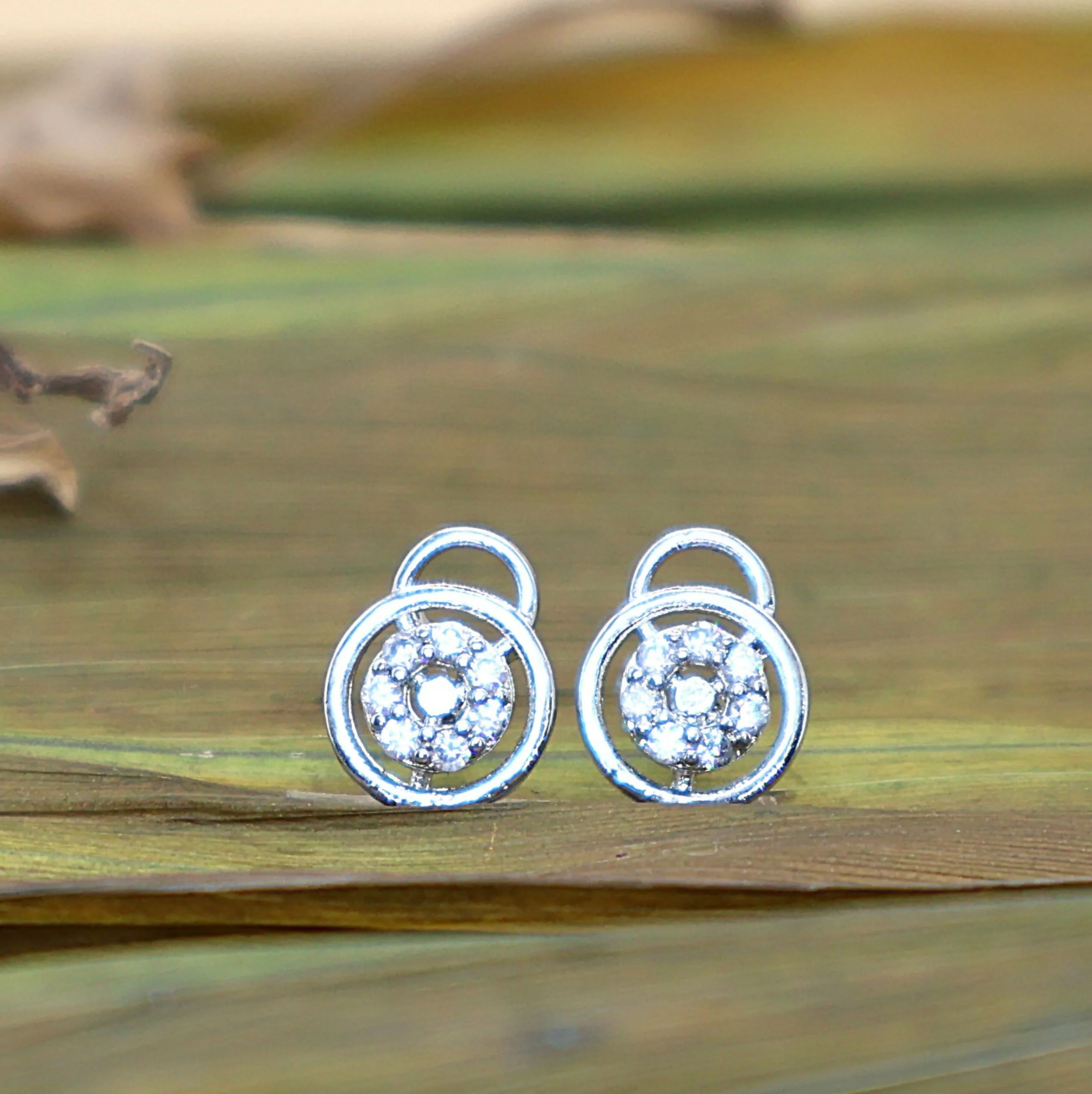 Silver Stud Earrings: Diamond-Look AD Circle Flower Design - Image 2