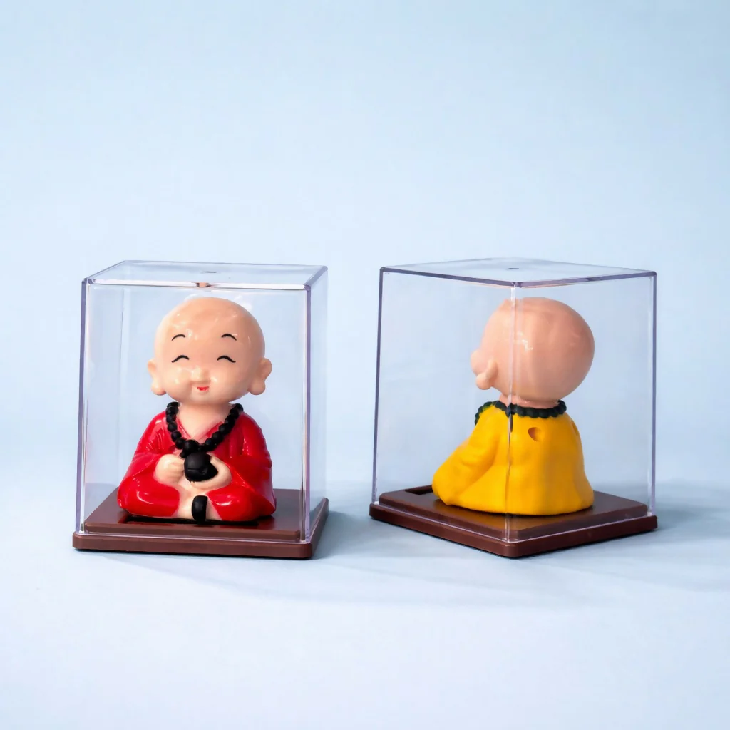 Solar Monk Bobble Head with Moving Head in Clear Display Case (Color may vary) - Image 2