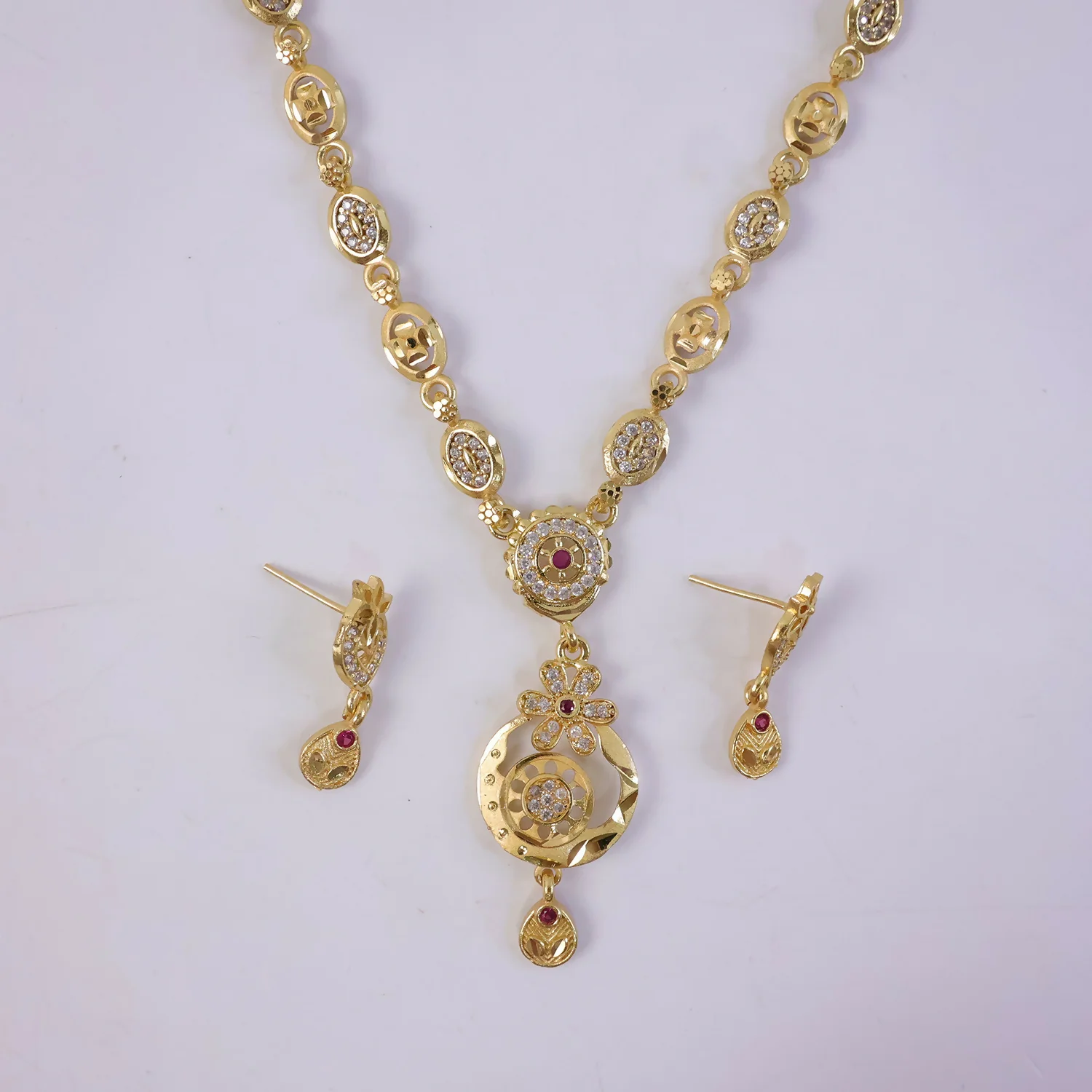 Stylish Gold-Tone Circular Pendant Necklace Set with Floral Accent & Matching Earrings - Image 4