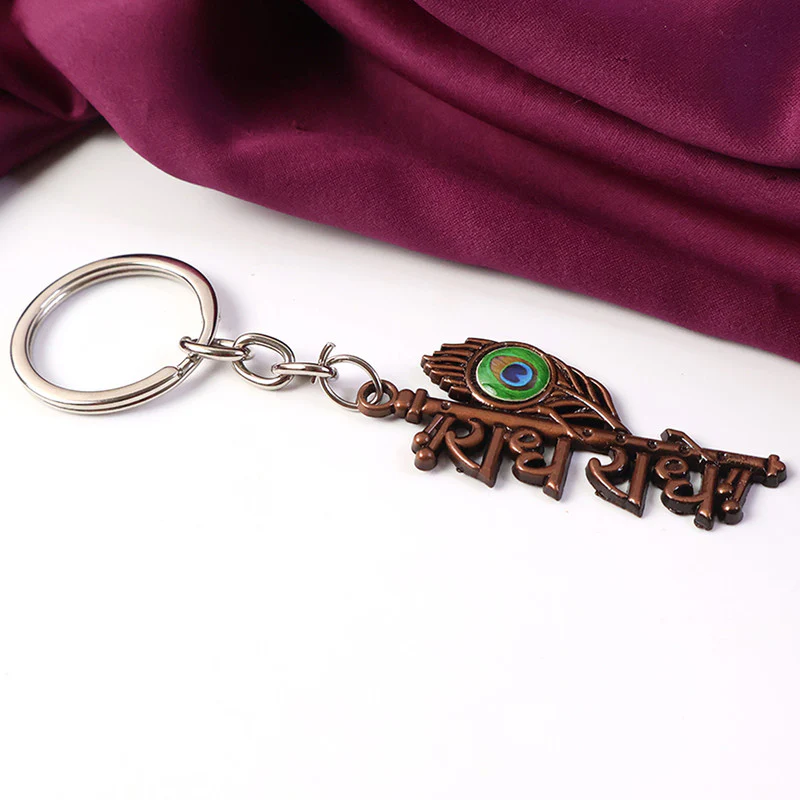 Radhe Radhe Metal Keychain with Peacock Feather Design – Divine Copper Finish (Mix Color) (1 Pc) - Image 6