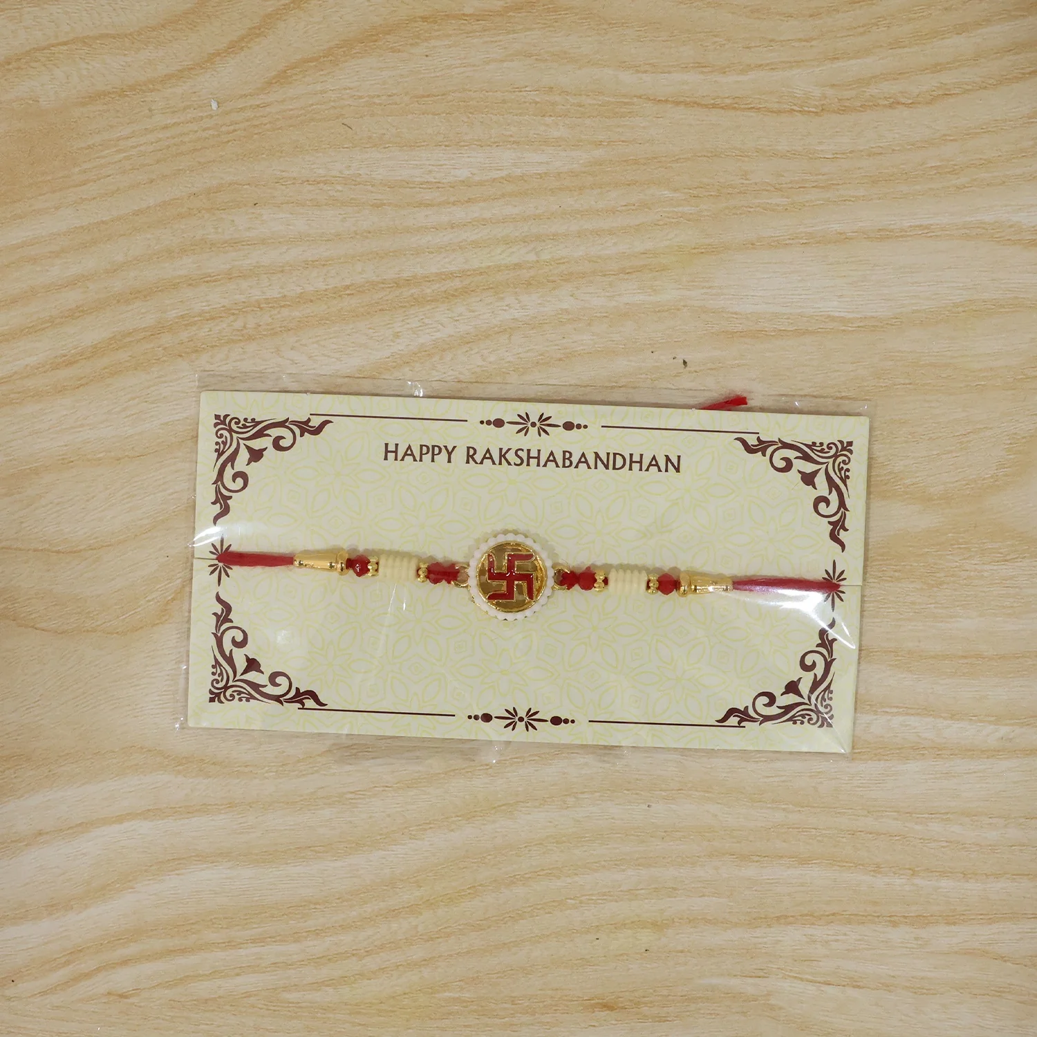 Swastik Pearl Frame Auspicious Rakhi - Image 7