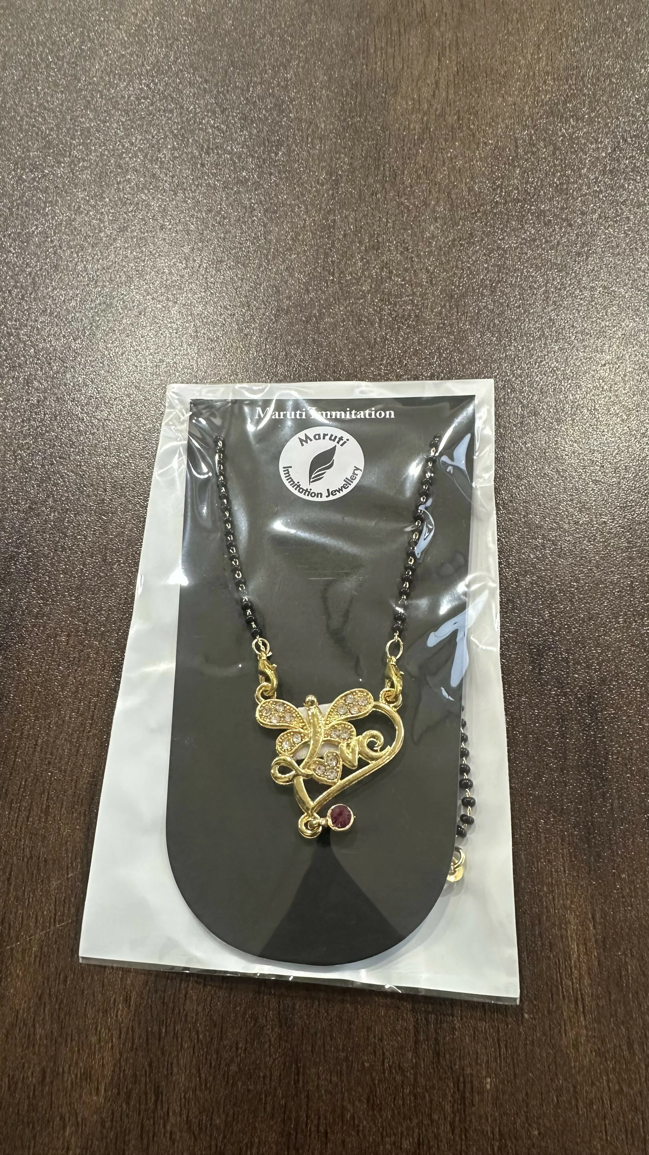 Butterfly Design Gold-Tone Mangalsutra with Sparkling Stones & Pink Dangler - Image 3