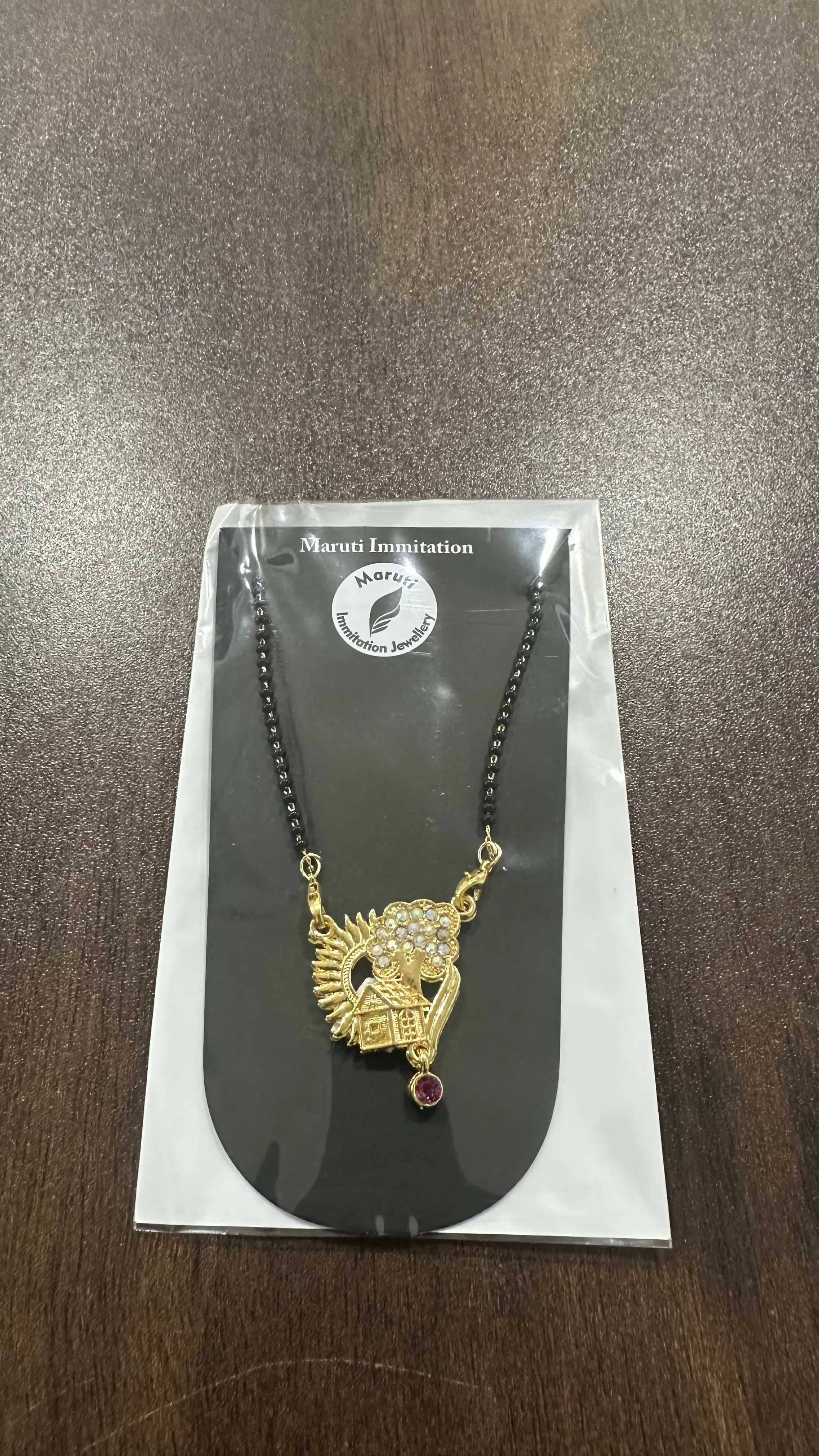 Gold-Tone Traditional Mangalsutra with Peacock-Inspired Stone Pendant - Image 4