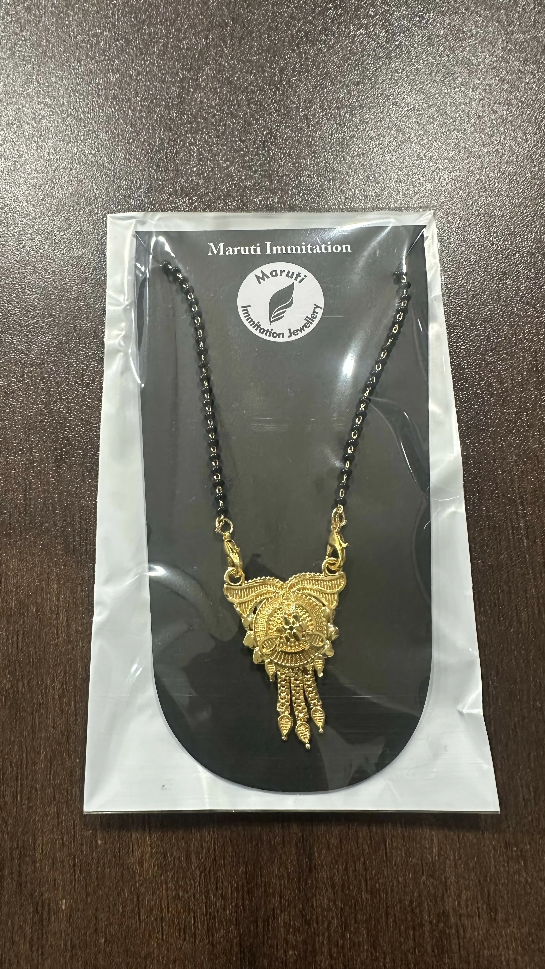 Elegant Gold-Tone Traditional Mangalsutra with Intricate Pendant Design - Image 4