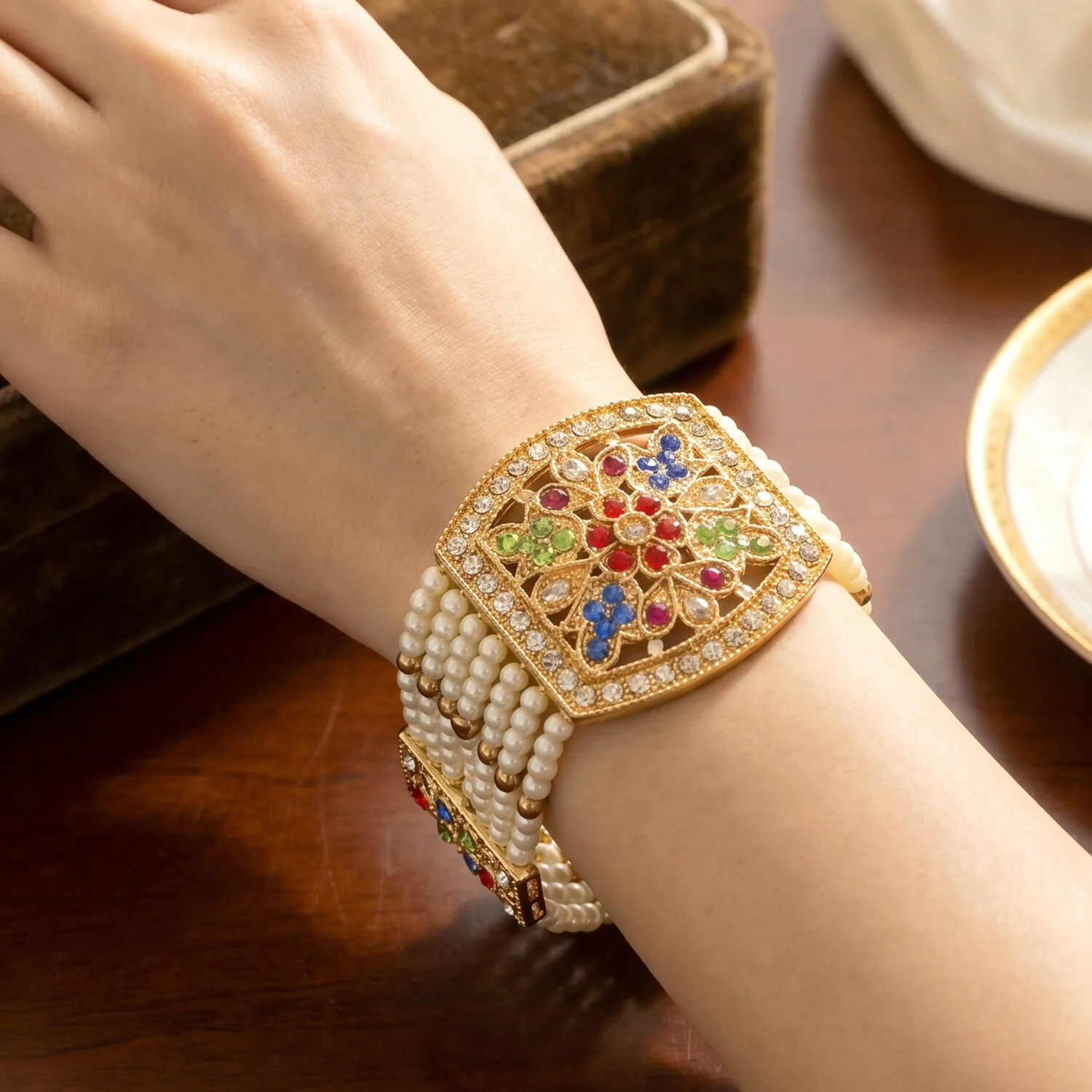 Traditional Pearl Bracelet with Intricate Gold Design and Multi-Colored Stones - Image 2