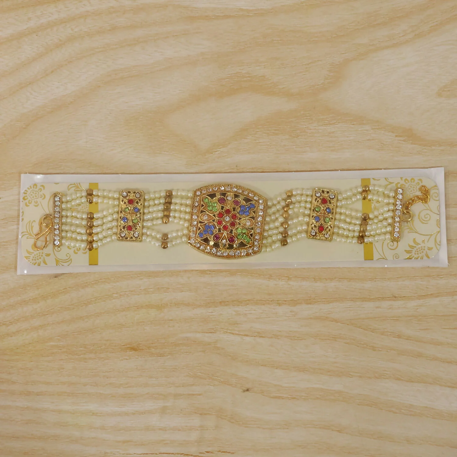 Traditional Pearl Bracelet with Intricate Gold Design and Multi-Colored Stones - Image 7