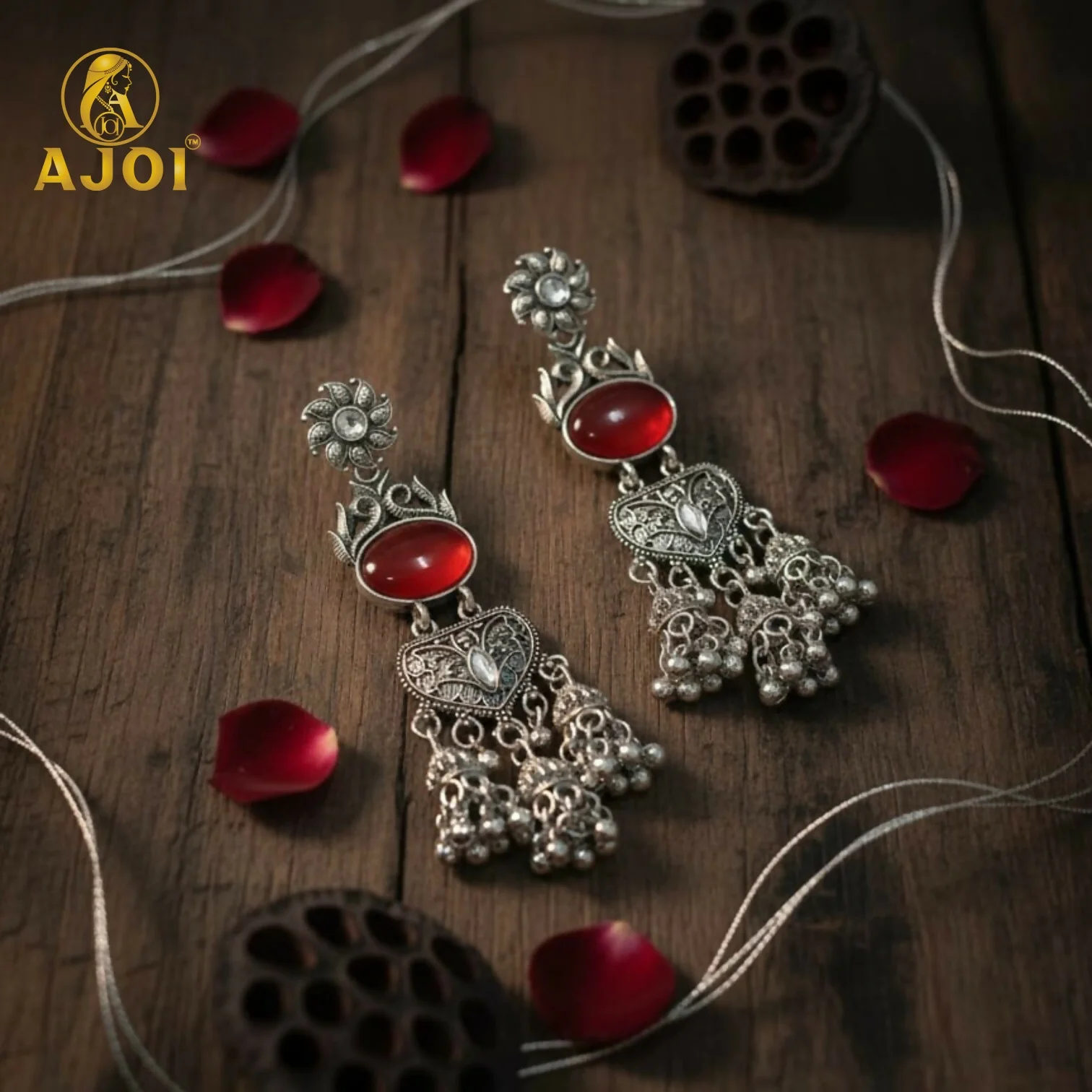 Vintage-Inspired Oxidized Silver Red Stone Jhumka Earrings with Ornate Filigree Design and Cascading Bell Danglers - Image 5